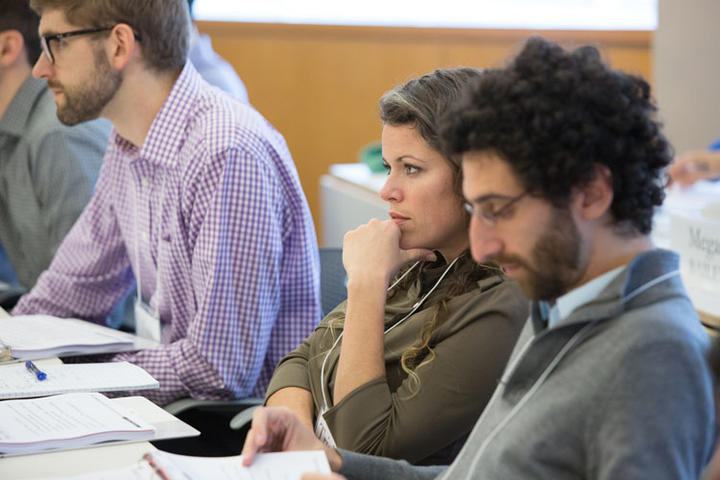 Pre-Doctoral Fellows listen to a presentation at the Alumni Workshop