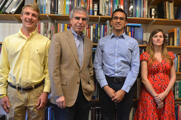 Ross Svenson, Professor Robert Stavins, Syon Bhanot, and Adriana Conconi