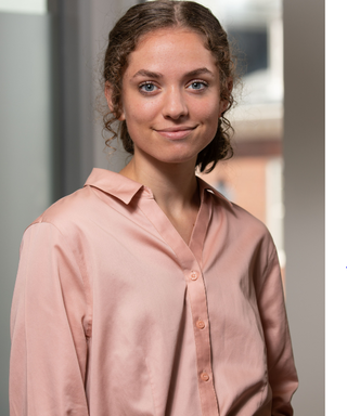Erica Sprott smiling in professional headshot