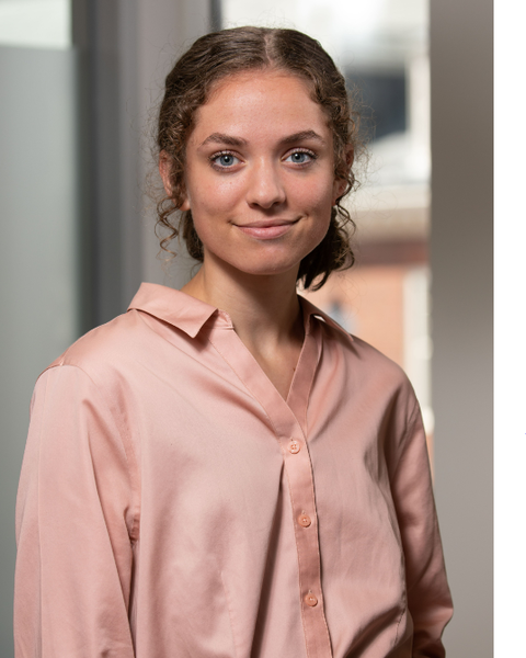 Erica Sprott smiling in professional headshot